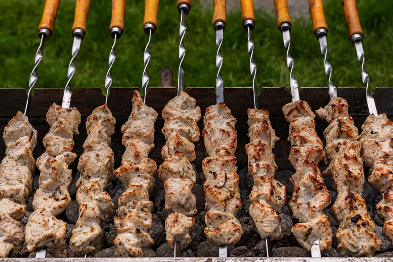 Chicken Barbecue (Mtsvadi) — Grilled chicken skewers with a tangy plum sauce.